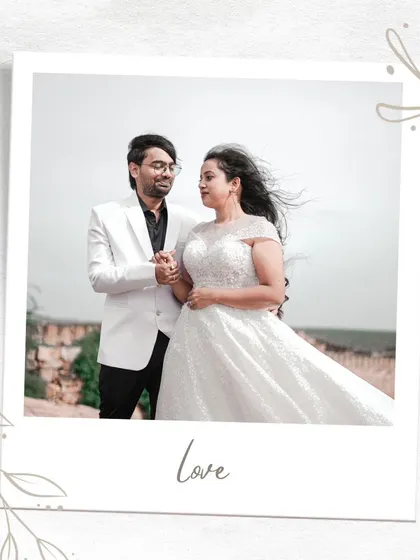 A classic polaroid-style portrait from a Gandikota pre-wedding shoot, capturing a romantic and windswept moment.