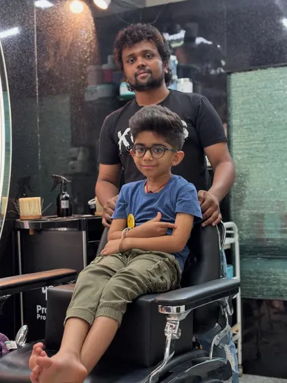 A photo with Agniv after his haircut. He's rocking his new style with confidence.