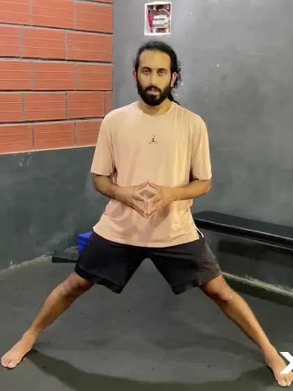 To run that extra mile, you need a strong foundation. Here I'm demonstrating a Cossack Squat, which is great for building lower body strength and mobility for runners.