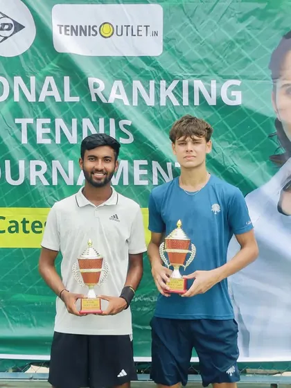Anup Bangargi, on the left, with his partner after winning the doubles title at the 1 Lac All India Men's Open Tournament in Hyderabad.