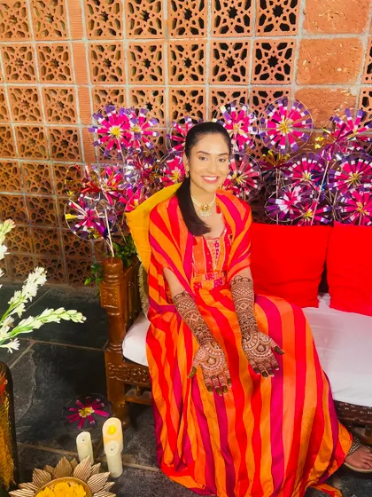 The bride Rupa looking radiant and happy at her beautiful mehendi ceremony.
