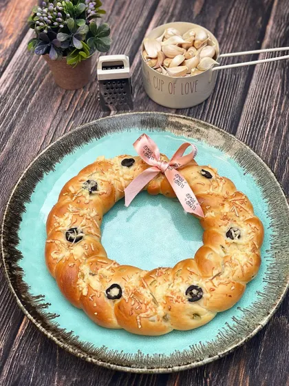 My Jalapeño Olive Cheese Wreath is another popular savoury bread for the holidays. It's braided and baked into a festive wreath shape.