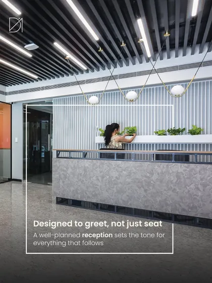 A reception desk should be designed to greet, not just to seat. This modern reception features a textured concrete-finish desk, vertical slat wall, and integrated planters, creating a sophisticated and welcoming entry point.