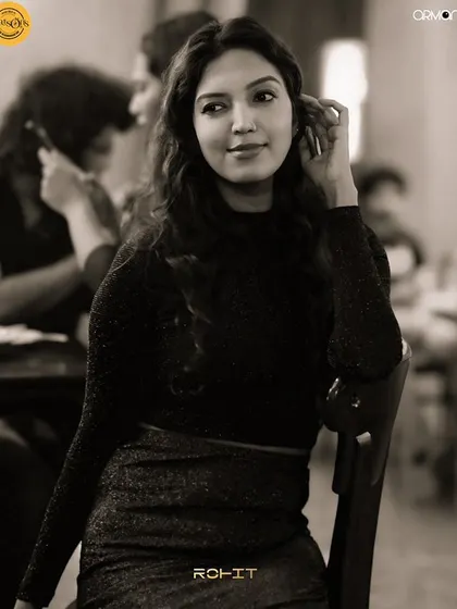 A sepia-toned shot of a guest at her table.