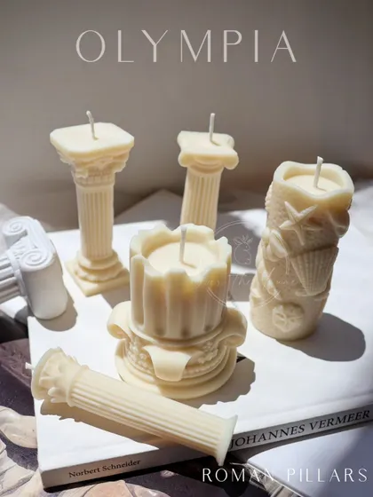 Another look at my Roman Pillar candles, including the sea-themed pillar. These pieces are perfect for creating a tablescape with varying heights and textures.