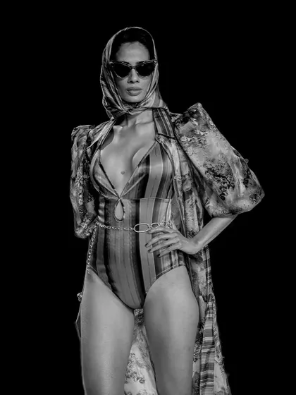 For me, black and white photography reveals the soul of the image. This shot is all about capturing bold confidence and high-fashion attitude, using strong contrast and a unique composition to create a truly striking and memorable portrait.