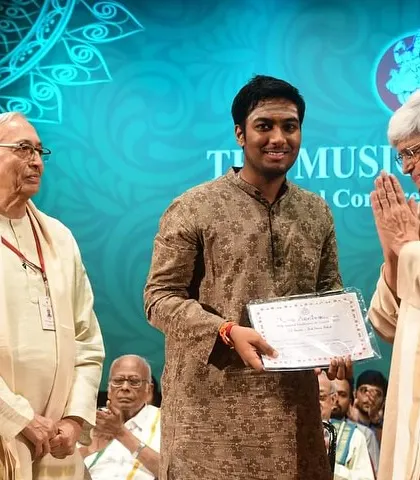 Receiving the Sub Senior Best Veena Artist award at the Madras Music Academy.