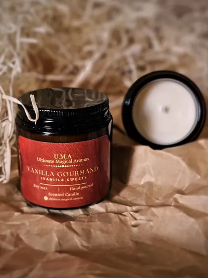 An open 'Vanilla Gourmand' candle next to its jar. The sweet, comforting scent is one of my most popular in the Gourmand collection.