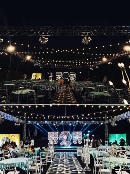 The overall seating and stage view of a modern Sangeet with a cool blue and white theme.
