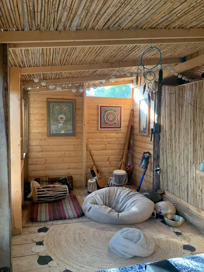 The cozy, rustic meditation space for our yoga retreat in Italy. We create a simple, sattvic atmosphere conducive to deep practice and relaxation.