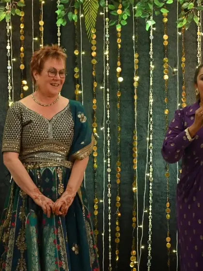 Explaining a game to international guests at a Sangeet. I ensure my instructions are clear and engaging for a diverse audience, making everyone feel included and ready to participate.