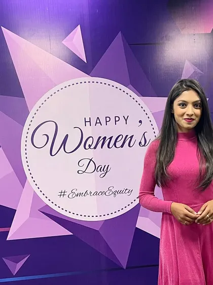 A vibrant pink dress for a Women's Day celebration at Steriscience. The outfit choice reflects the positive and celebratory theme of the day.