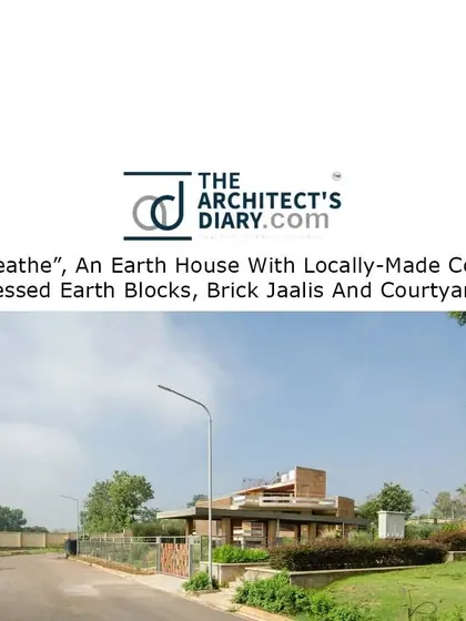 A screenshot of a feature on "Breathe" in The Architect's Diary, showcasing the home's integration with its landscape from the street view.