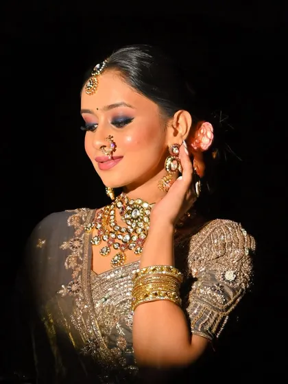 A subtle yet striking look. The smokey eye and nude lip combination is a classic for a reason.