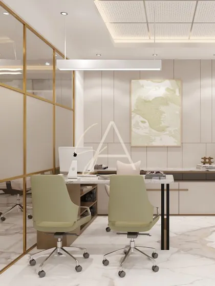 This cabin view highlights the gold-framed glass wall that separates the office while maintaining a visual connection to the rest of the workspace. The design is clean, bright, and professional.