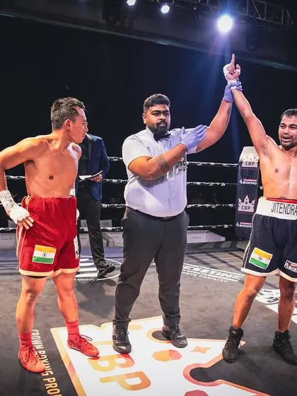 The referee raises the winner's hand. This is the moment of truth for every fighter.