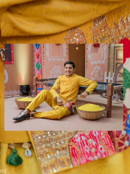 A relaxed portrait of the groom seated on a traditional charpoy at the Haldi ceremony.