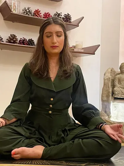 Meditating in my personal practice space. I believe in surrendering to the universe and trusting the journey, and yoga is the path that shows the way to inner peace.