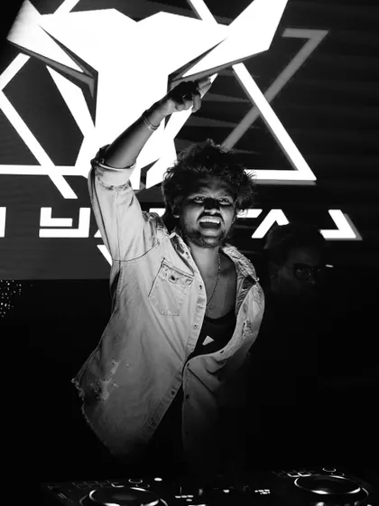 A powerful black and white shot capturing the peak energy of a special themed night.