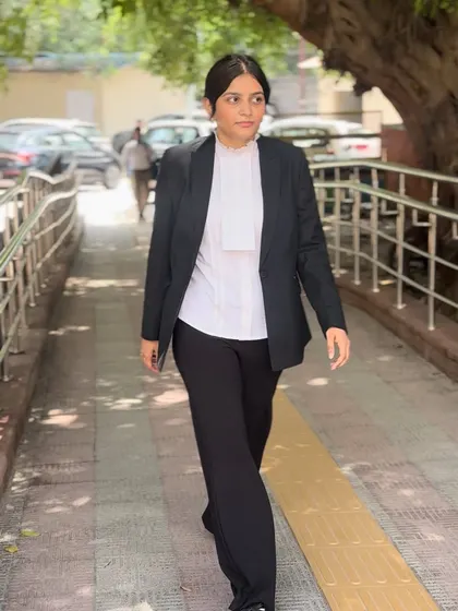 Walking towards the courtroom with purpose. Each step is a commitment to fighting for justice against online offenses and protecting my client's digital rights.