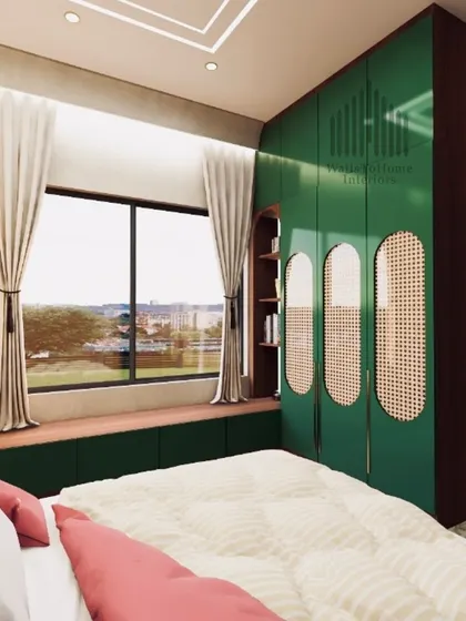 Another angle of the green wardrobe bedroom, showing the view from the window and the serene, nature-inspired color palette.