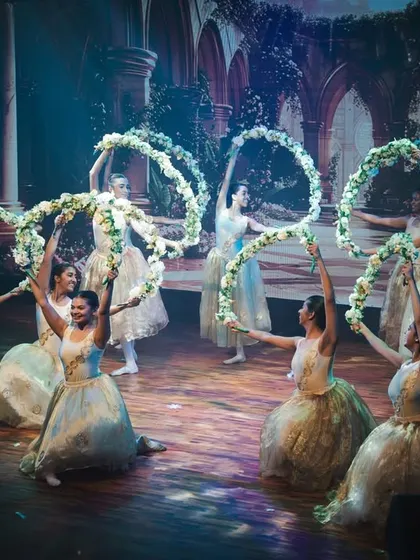 The graceful "Sleeping Beauty Waltz," a piece that showcases elegance and unity. Our dancers perform with props like these floral hoops to enhance the visual storytelling.