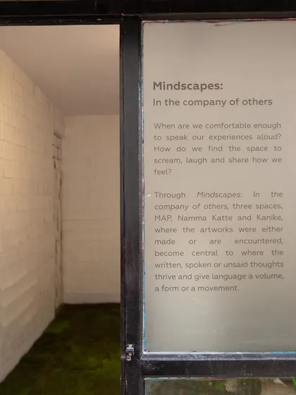 A view into the immersive "Mindscapes" installation at our studio. The entrance text sets the stage for the powerful themes explored within the artwork.