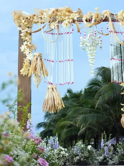 A close-up of the handcrafted details on the beachfront mandap, showcasing a blend of Indian and local Vietnamese artistry.