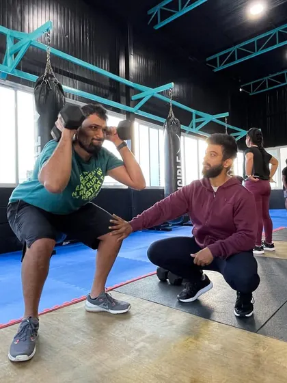 That look you give when the coach says "one more rep" for the fifth time. Our coaches are there to push you past your perceived limits while ensuring your form remains solid.