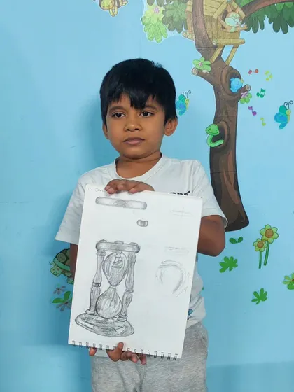 This student did an amazing job on his pencil sketch of an hourglass, capturing the intricate details and shading.