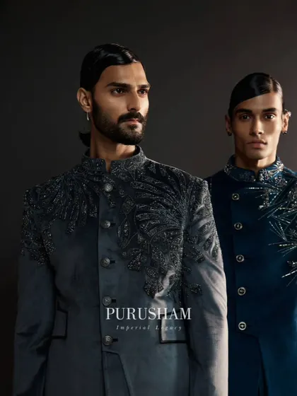 Leave an everlasting statement. This image pairs a grey velvet jacket with a teal one, both featuring distinct embroidery patterns. It's about creating a stylish quotient that is beyond comparison.