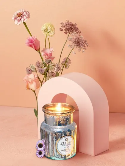 A beautiful Blue Island Water candle, perfect for a Valentine's date night. Its fresh and unique aquatic notes are a favorite for both men and women.