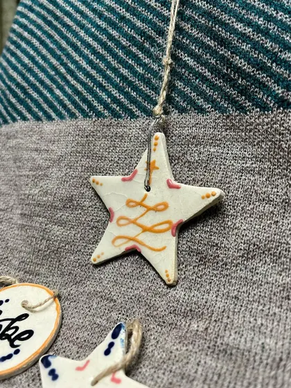 A close-up of one of the star ornaments from the 'Hope' set.