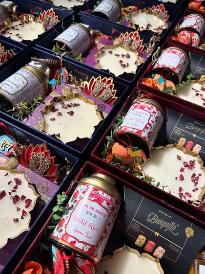 An assortment of our premium Diwali hampers for Aum Papers and Label Affairs. You can see the different color schemes and product combinations we offer.