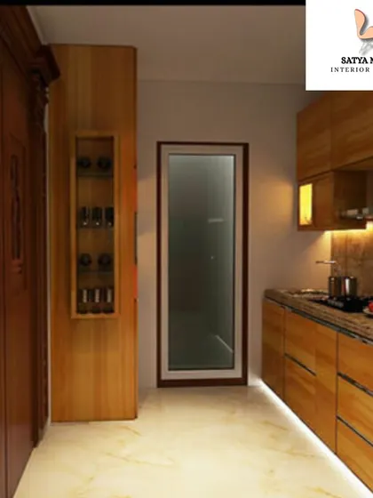 A kitchen designed with a traditional touch, featuring all-wood cabinetry and warm under-cabinet lighting.