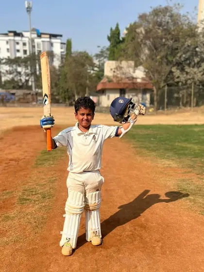 The pure joy of a match-winning performance. This young player celebrates after leading his team to victory, a moment that builds immense confidence and character.