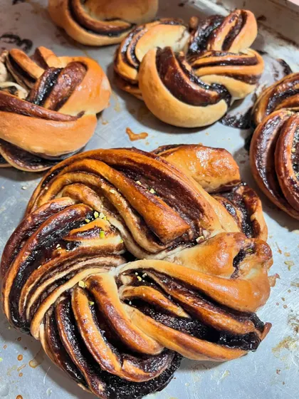 Another look at our beautiful chocolate babka, with its intricate swirls of bread and chocolate.