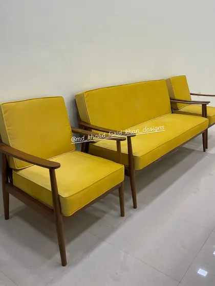 Different angle of the vibrant yellow mid-century modern sofa set.