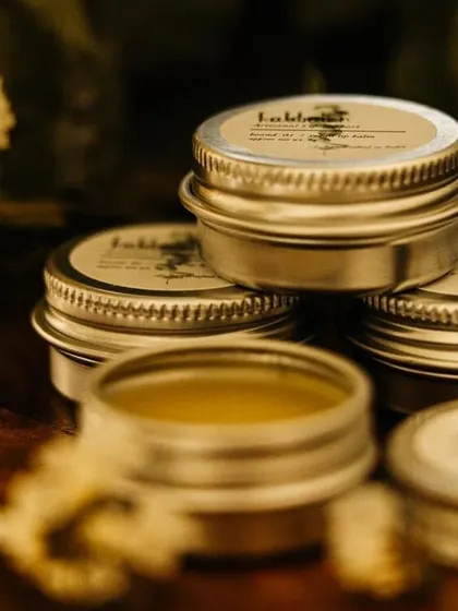A stack of my 'Boond' vegan lip balms. The compact tins are easy to carry with you for on-the-go hydration.