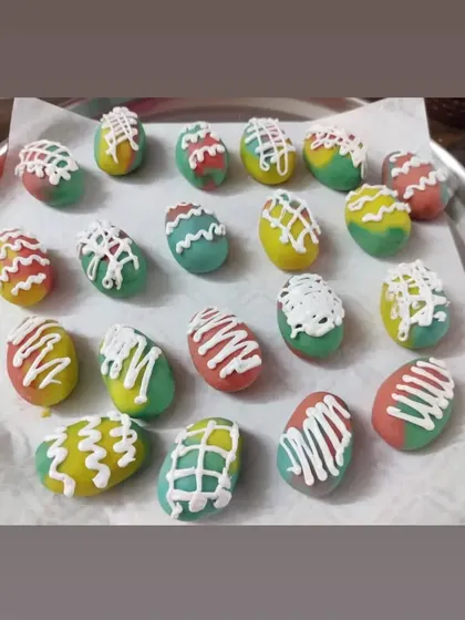 Another look at my decorated Easter egg cakesicles. The colorful base and white drizzle make them a cheerful addition to any Easter celebration.
