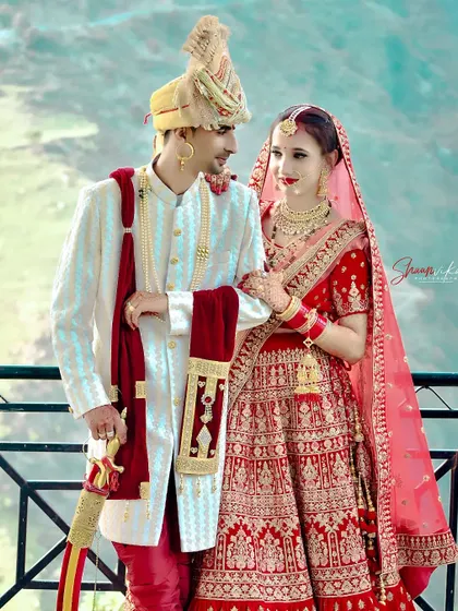 A beautiful couple portrait with the stunning Himachali mountains in the background. I use our local landscapes to make your wedding photos truly special.