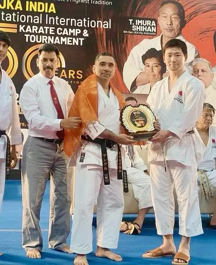 Receiving an award at the 1st JKA India Invitational International Karate Camp. This recognition from senior JKA officials is an honor for me and my entire dojo.