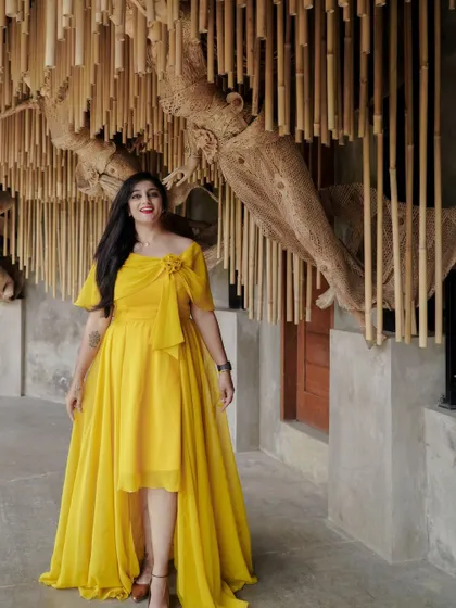 Another view of the client's cheerful and elegant yellow gown.
