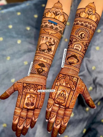 A beautiful blend of auspicious and royal themes, this design includes Ganesha, a kalash, royal elephants, and swans.