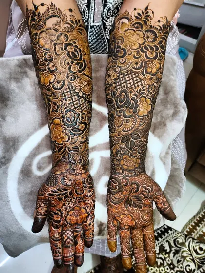 A gorgeous full-arm design for a mom-to-be. Celebrating this special milestone with beautiful, intricate henna is always an honor.