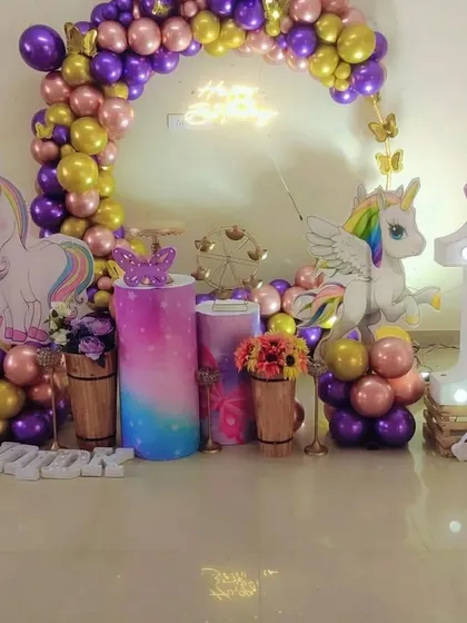 A centered view of the purple and gold unicorn decor.