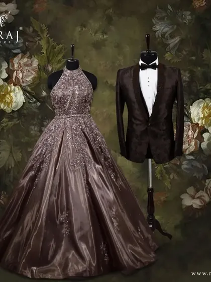 Embracing the beauty of brown, this couple's look is one of quiet confidence. The groom's Italian-textured tuxedo with embossed patterns pairs beautifully with the bride's voluminous organza tissue gown.
