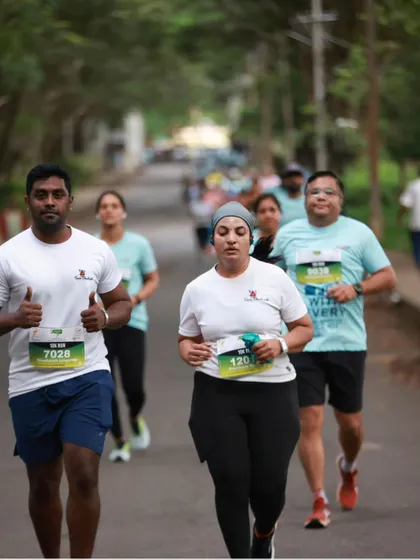 Running with grit and focus. Our team members pushing through the Mysuru Run course.