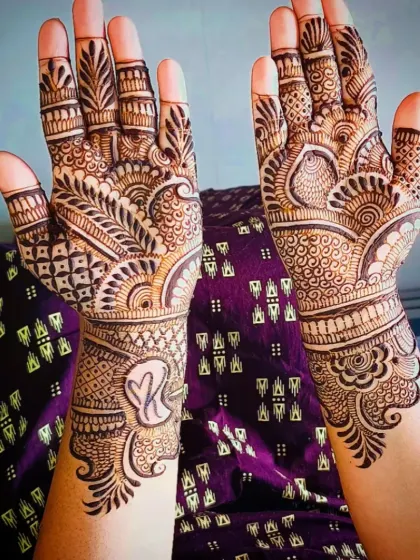A clear view of the 'K' initial design on the wrist.
