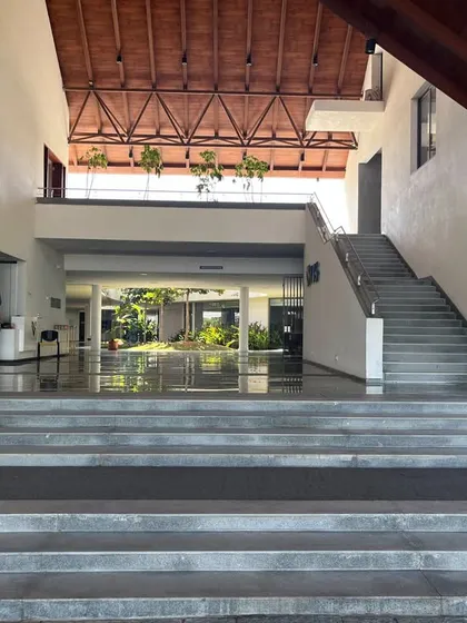 A duplicate image of the main entrance and staircase at Vellore International School.